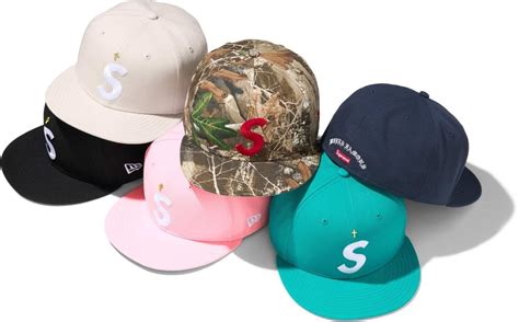 supreme gold cross hats